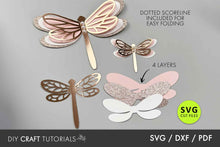 Load image into Gallery viewer, Dragonfly-shaped cutout with layers and SVG cut files on a gray background