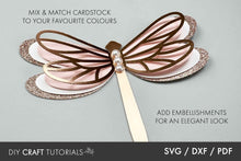 Load image into Gallery viewer, Dragonfly-shaped cardstock with embellishments on a gray background, featuring text about customizable colors and DIY craft tutorials.