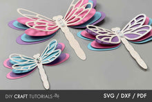Load image into Gallery viewer, Three paper dragonflies in pastel colors on a gray background with 'DIY Craft Tutorials' text.