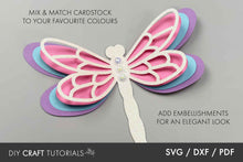 Load image into Gallery viewer, Decorative butterfly cardstock with pink, blue, and purple layers on a gray background.
