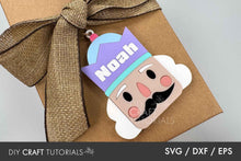 Load image into Gallery viewer, Gift box with a decorative tag featuring a cartoon character named &#39;Noah&#39; on a plain background.
