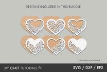 Load image into Gallery viewer, Set of heart-shaped cutout designs with floral patterns on a gray background, labeled 'DIY Craft Tutorials'.
